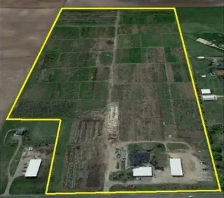 Aerial photo of the 72-acre Al-Maghfirah Cemetery property outlined in yellow, Castle Rock Township near Farmington, Minnesota